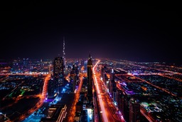 Stunning Dubai Skyscraper City Lights and Architecture Background: Free Download for Graphic Design and Social Media Styling