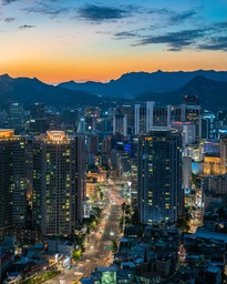 Explore Stunning Cityscapes at Sunset: Free City and Architecture Backgrounds in JPG Format for Web Design and Social Media Pages