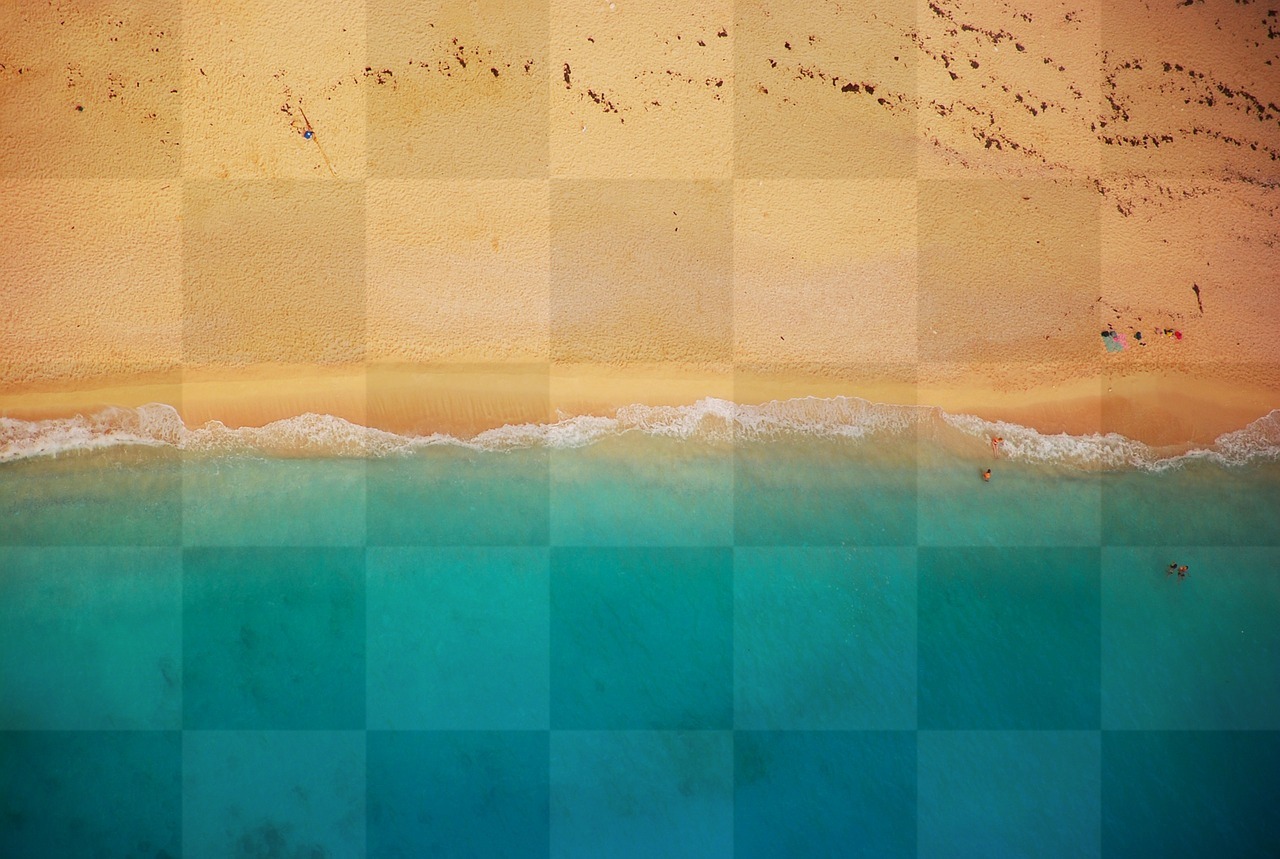 Get the Perfect Beachy Summer Vibes with Our Free Aerial View Shoreline Background in JPG Format